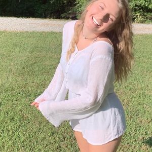 Beautiful white romper! From the brand Legaci! Size small!